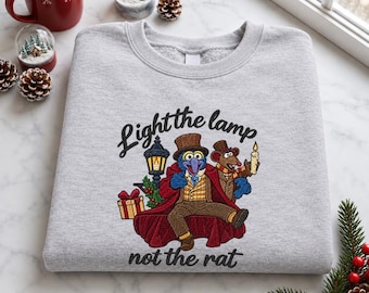 Light The Lamp Not The Rat Embroidered Shirt, Gonzo and Rizzo Xmas Sweatshirt, Muppet Christmas Carol Shirt, Disneyland Holiday Trip Gift