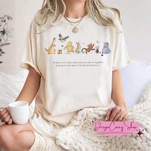 レトロなくまのプーさんと仲間たちのTシャツ、ディズニーのくまのプーさんシャツ、ディズニーのプーさんベアシャツ、ディズニーランドのプーさんと仲間たちのTシャツ