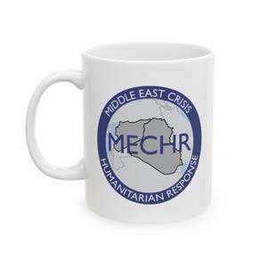 May include: White ceramic mug with a handle. The mug features a blue and gray graphic with the text "MIDDLE EAST CRISIS HUMANITARIAN RESPONSE" and the acronym "MECHR". The design includes a map outline.