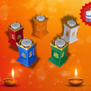 May include: A collection of colorful, decorative candle holders in red, orange, blue, green, and white, each with a gold trim and a lotus flower design. The image includes a red starburst with the text "Tealight included".