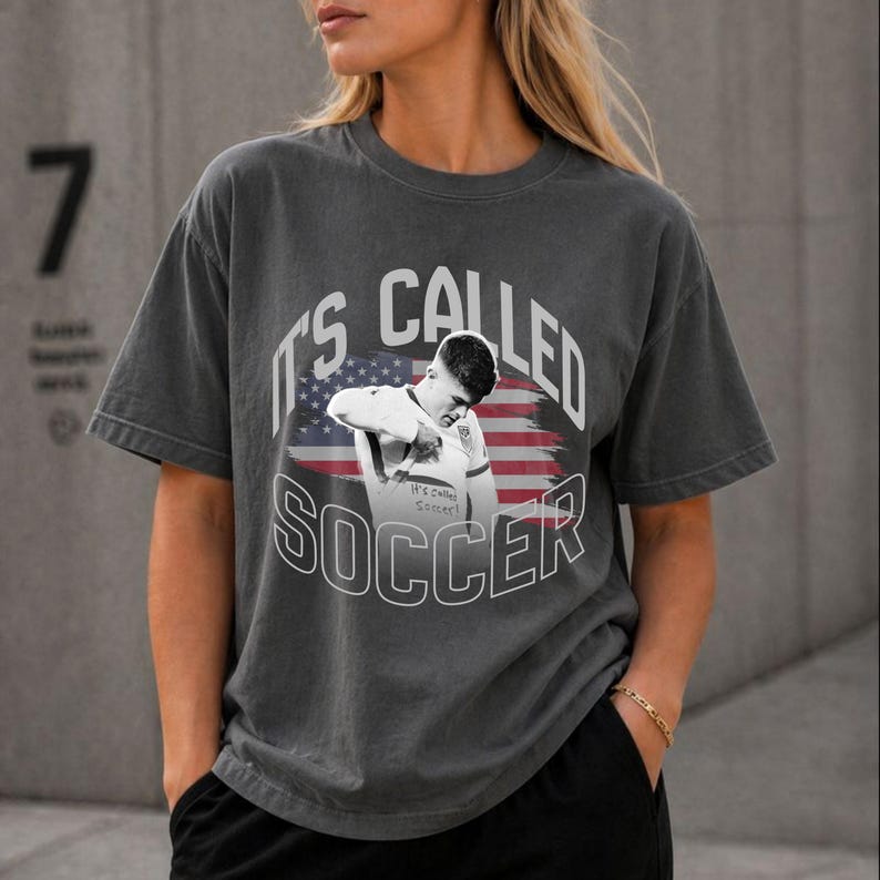 Vintage gray soccer shirt on female model, USA flag graphic tee, relaxed fit Comfort Colors style