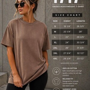 May include: A woman wearing a brown Comfort Colors 1717 unisex heavyweight t-shirt and black shorts. The shirt has a relaxed fit and is garment-dyed. The size chart shows chest and length measurements in inches.