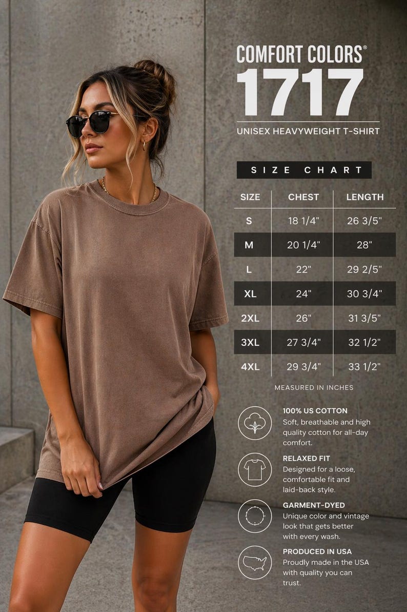 May include: A woman wearing a brown Comfort Colors 1717 unisex heavyweight t-shirt and black shorts. The shirt has a relaxed fit and is garment-dyed. The size chart shows chest and length measurements in inches.