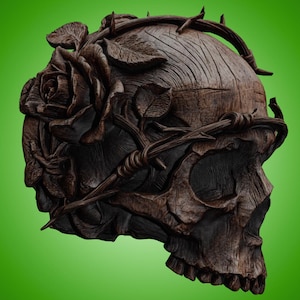 May include: A detailed wooden skull sculpture with a rose and thorny vines carved into its surface. The skull is brown with visible wood grain, and the rose and vines add a decorative element. The sculpture is set against a green background.