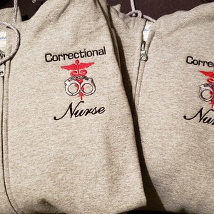 Sudadera con capucha y cremallera completa para enfermera correccional. Envío gratuito.