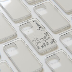 May include: Clear phone case with a white and black design. The design features the text "She is clothed with strength and dignity" and a cactus and boot graphic. The word "Summer" is also included in the design.