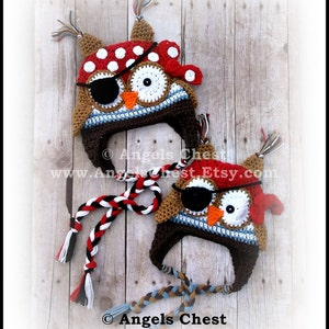 May include: Two crocheted owl hats with red and white pirate bandanas, black eye patches, and brown, white, and blue details. The hats have long braided cords.