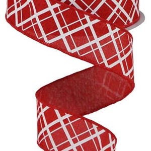 May include: Red and white wired ribbon with a plaid pattern. The ribbon is 2.5 inches wide and has a white background with red criss-cross lines.