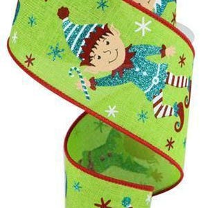 May include: Green ribbon with a red border featuring a repeating pattern of elves wearing blue and green outfits with white and red striped stockings. The elves are holding candy canes and have sparkly accents.