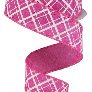 May include: Pink and white ribbon with a plaid pattern. The ribbon is 2.5 inches wide and is made of a soft, textured fabric.