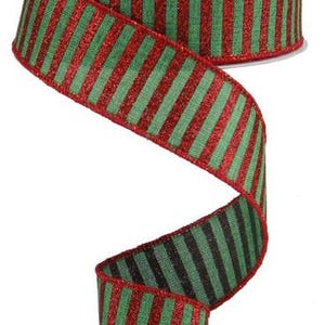 May include: Red and green striped ribbon with a glittery finish. The ribbon is 2.5 inches wide.