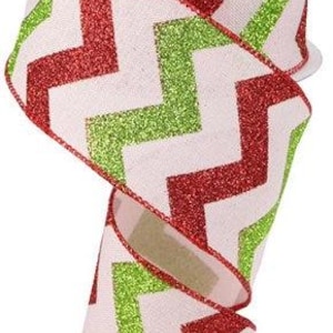 May include: Red and green glitter chevron ribbon with a white background. The ribbon is 2.5 inches wide and is perfect for crafting and decorating.