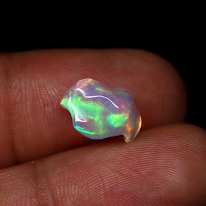 Naturlig Welo-opal grov, AAA-kvalitet, fri form, 12 x 8 mm (2,55 ct)