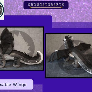 May include: Two plush dragon toys with posable wings. One dragon is shown from the side, the other from above. The dragons are primarily black, grey, and white, with a spotted pattern on the body and tail. The text "CROWCATCRAFTS" is at the top.