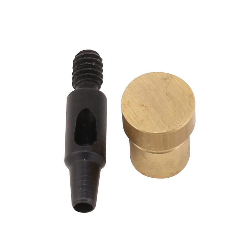 May include: Two-piece metal tool set. One piece is black with a threaded top and a tapered end. The other piece is a solid, cylindrical brass component. The tools are likely used for leatherworking or similar crafts.