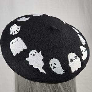 Halloween ghost black and white wool beret. Embroidered design.