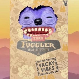 May include: A purple plush toy with a large, toothy grin. The toy is labelled "Fuggler Funny Ugly Monster" and "Vacay Vibes".