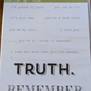 May include: A set of 10 rubber stamps with positive affirmations. The stamps are black and white and feature the words "Words of Truth" and "Remember". The stamps are designed to be used for scrapbooking, card making, and other craft projects.