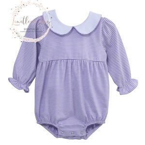 May include: A purple and white striped baby onesie with a light blue peter pan collar.