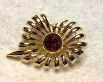 Vintage 1970's gold metal stems amber glass center brooch pin.