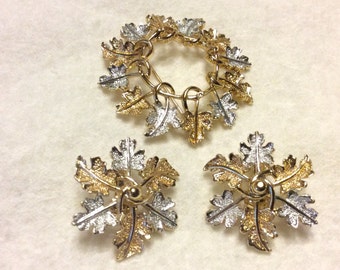 Sarah Coventry gold and silver leaves brooch clip on earrings set. Free ship to US