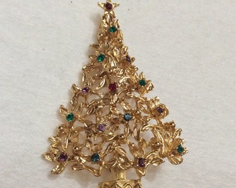 Christmas tree shaped brooch pin multi colored rhinestones .