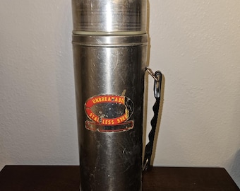 Termo vintage Uno-Vac de acero inoxidable