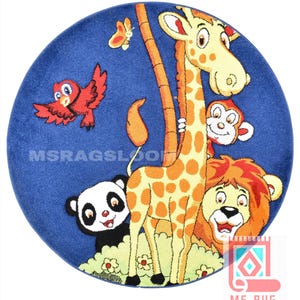 May include: A round blue rug featuring a cartoon jungle scene. A giraffe, lion, monkey, panda, and red bird are depicted. The rug has a white border and the text "MS RUG SINCE 1996".