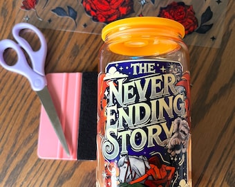 The never ending story 16oz yellow glass cup with acrylic straw and lid