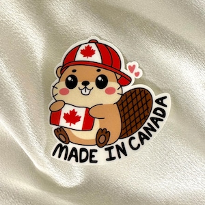 Bonita calcomanía de vinilo de castor con bandera canadiense, hecha en Canadá. Ideal para laptop, equipaje, funda de teléfono, auto y botella de agua.