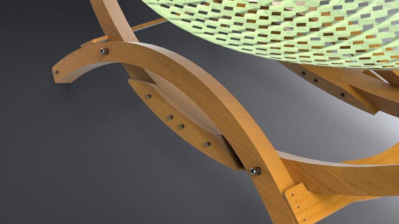 May include: Close-up of a wooden hammock frame with a light green woven seat. The frame is made of light-colored wood and features curved supports. Metal bolts secure the frame's components.