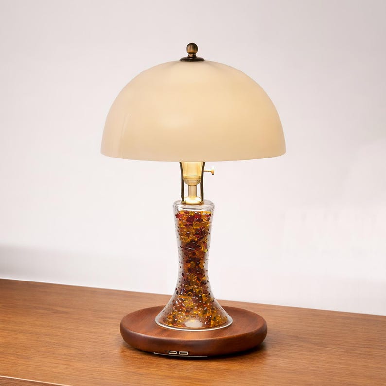 Handmade bone china table lamp with a translucent shade, solid Huali wood base, brass fittings, and dual USB ports on a wooden tabletop.
