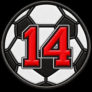 May include: A circular embroidered patch featuring a black and white soccer ball pattern as the background. Centered on the patch is the number 14 in a bold, bright red font with a thick black outline, creating a high-contrast sports design.