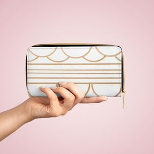 Cartera con cremallera, cartera con patrón sofisticado en blanco y dorado, cartera funcional de moda, cartera elegante con compartimentos, cartera con cierre de cremallera para