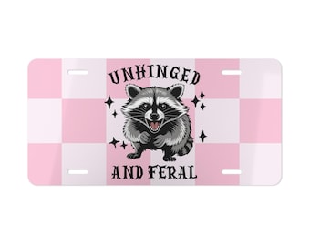Unhinged and Feral Raccoon Vanity Plate, Funny Front License Plate, Pink Plaid Background