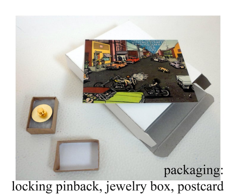 May include: A postcard featuring a vintage illustration of a city street scene with cars and motorcycles. The postcard is packaged in a small cardboard box with a locking pinback.