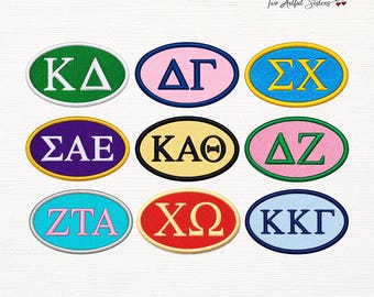 May include: Nine oval embroidered patches featuring Greek letters in various color combinations. The patches include combinations like green and white, pink and blue, yellow and blue, purple and white, yellow and black, pink and green, blue and pink, red and yellow, and light blue and dark blue.