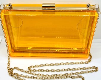 Transparent Orange Acrylic Clutch | Golden statement bag with chain | Elegant evening bag