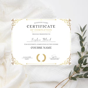 May include: A white certificate with gold filigree borders and text. The certificate reads "Certificate of Completion" and includes the name "Sophia Black" and space for a course name, date, and signature.