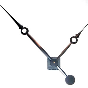 May include: Black clock hands with a square mounting plate. The hour hand is long and thin with a circular end. The minute hand is shorter and thicker with a round end.