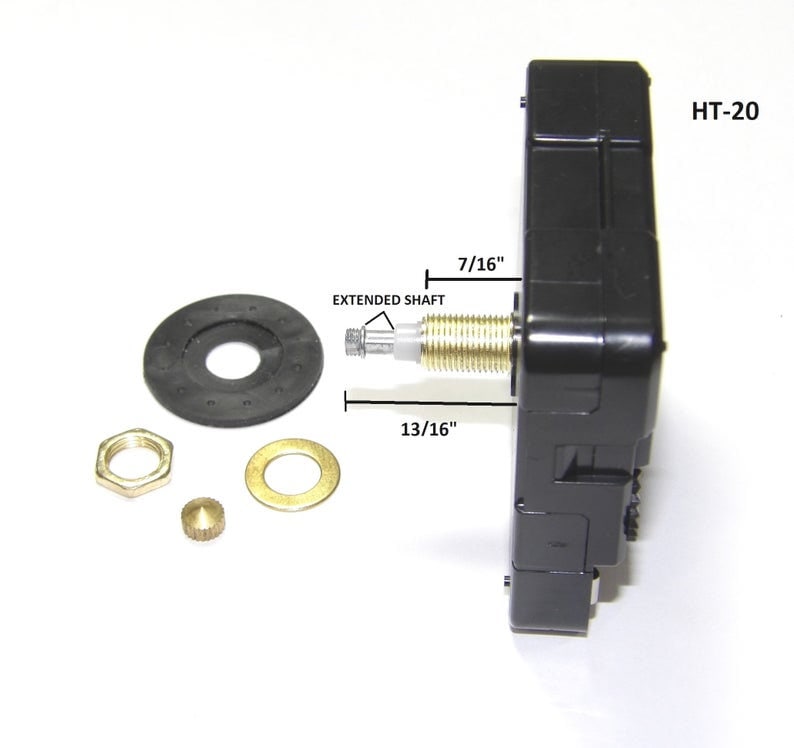 May include: Black clock movement with a 7/16 inch extended shaft and a 13/16 inch overall length. The movement is labeled HT-20. The image also shows a black washer, a gold nut, a gold washer, and a gold pin.