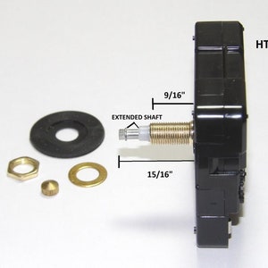 May include: Black clock movement with a 9/16 inch extended shaft and a 15/16 inch total shaft length. The movement is labeled HT-23. The package includes a black washer, a gold nut, a gold washer, and a gold pin.