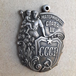 silver breast medal of the ussr &quot;maternal glory&quot;