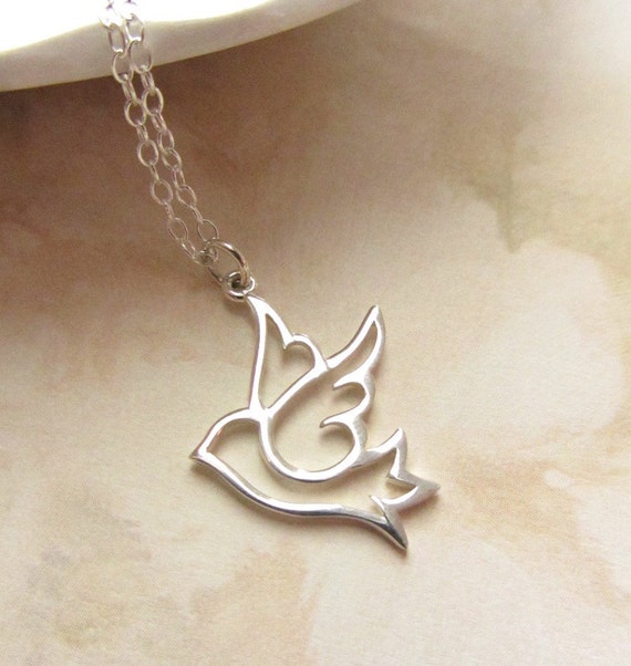 Items similar to Dove Bird sterling silver charm necklace, Minimal