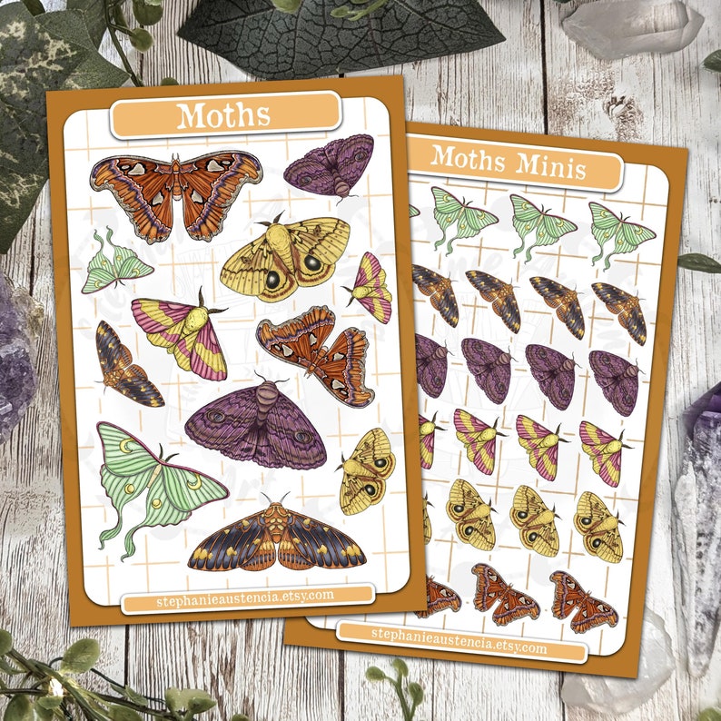 May include: Two sheets of stickers featuring colorful moth illustrations. The first sheet is titled "Moths" and features larger, more detailed moths. The second sheet is titled "Moths Minis" and features smaller, more simplified moth illustrations.