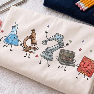 May include: A cream-coloured fabric featuring a cartoon graphic of five anthropomorphic science and technology items: a blue liquid-filled flask, a brown microscope, a grey robotic arm, a grey laptop, and a red circuit board, all with smiling faces.