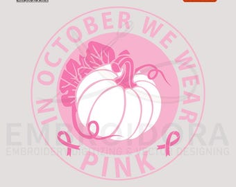 May include: A pink and white digital design featuring a pumpkin and pink ribbon, with the text "IN OCTOBER WE WEAR PINK". The design is for embroidery digitizing and vector designing.