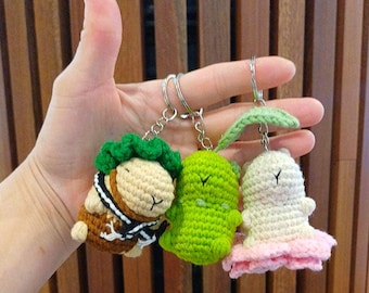 手作りカピバラのかぎ針編みキーホルダー - ミニあみぐるみカピバラチャーム - かわいい動物バッグチャーム - 手作りギフトアイデア