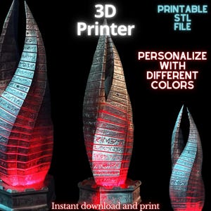 Może przedstawiać: Trójwymiarowy model wydrukowany z tworzywa sztucznego, przedstawiający wysoką, smukłą, dwustronną strukturę o fakturowanej powierzchni i skomplikowanych detalach. Struktura jest podświetlona od dołu czerwonymi światłami. Na obrazie widoczny jest tekst "PRINTABLE STL FILE" i "PERSONALIZE WITH DIFFERENT COLORS".