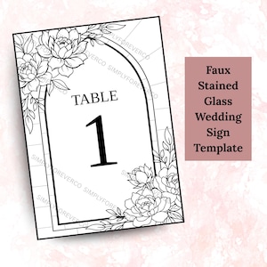 May include: A black and white wedding table number card with floral corner designs. The card reads "TABLE 1" in bold font. The text "Faux Stained Glass Wedding Sign Template" is in a pink rectangle.